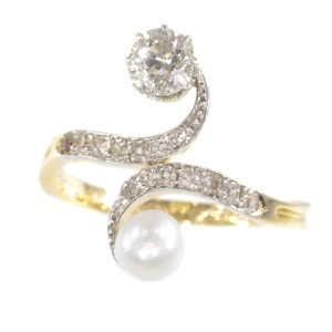 Elegant Belle Epoque diamond and pearl engagement ring so called toi et moi